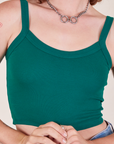 Front view of Cropped Cami in Hunter Green worn by Alex