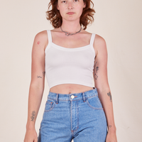 Alex is 5'8" and wearing P Cropped Cami in Vintage Off-White worn with light wash Frontier Jeans