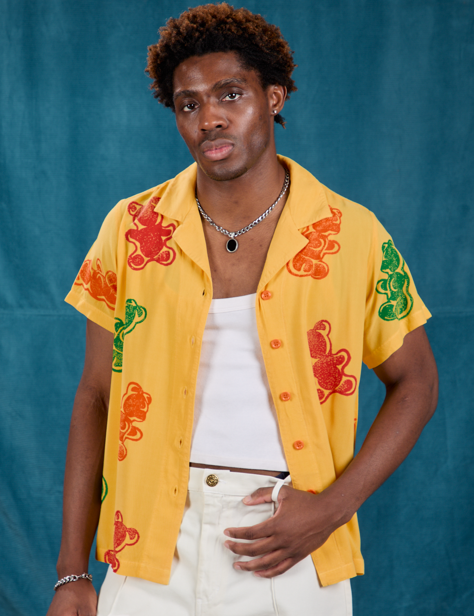 Isaac is 5&#39;10&quot; and wearing M Gummy Bear Pantry Button-Up 