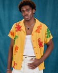 Isaac is 5'10" and wearing M Gummy Bear Pantry Button-Up 