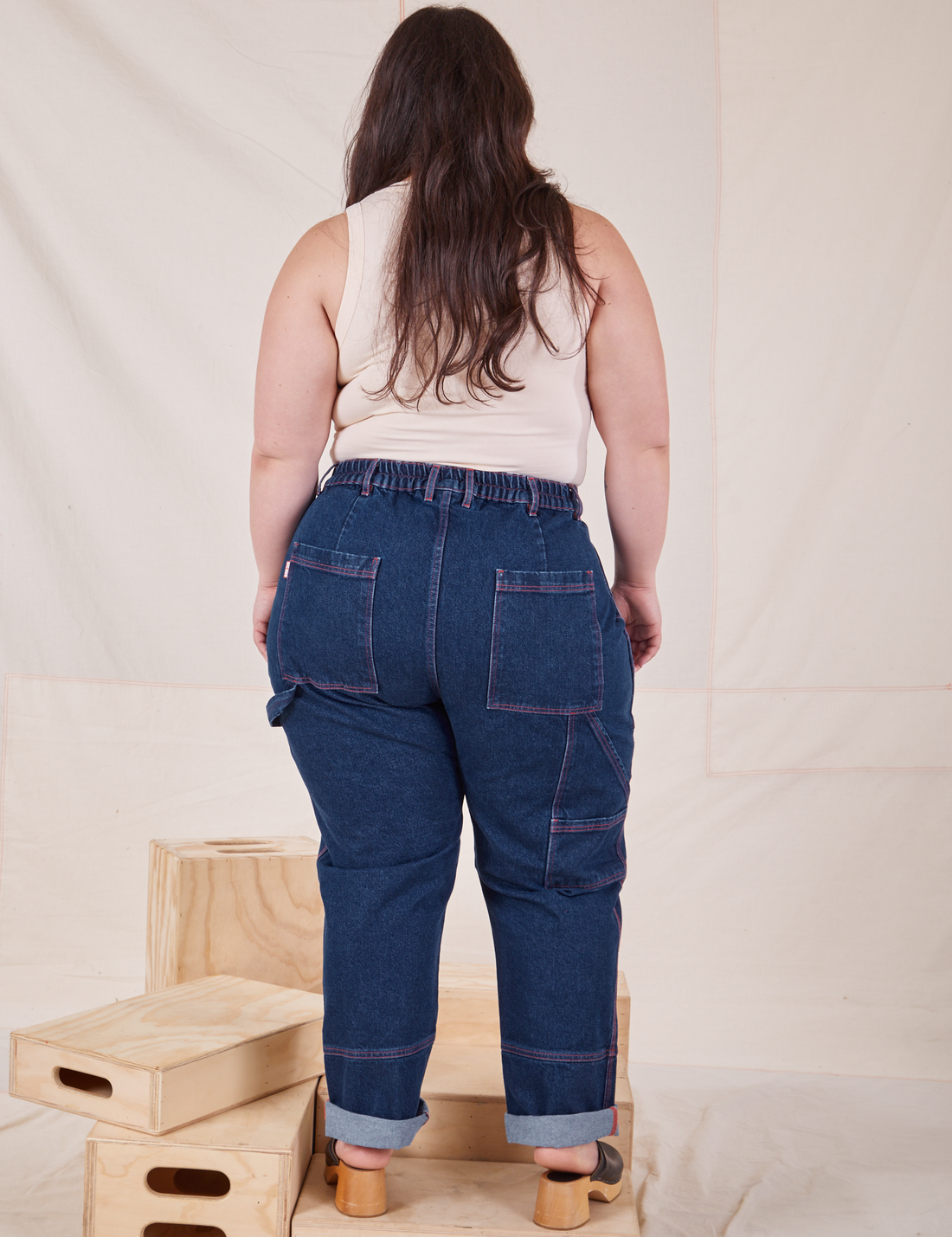 Back view of Carpenter Jeans in Dark Wash worn by Ashley