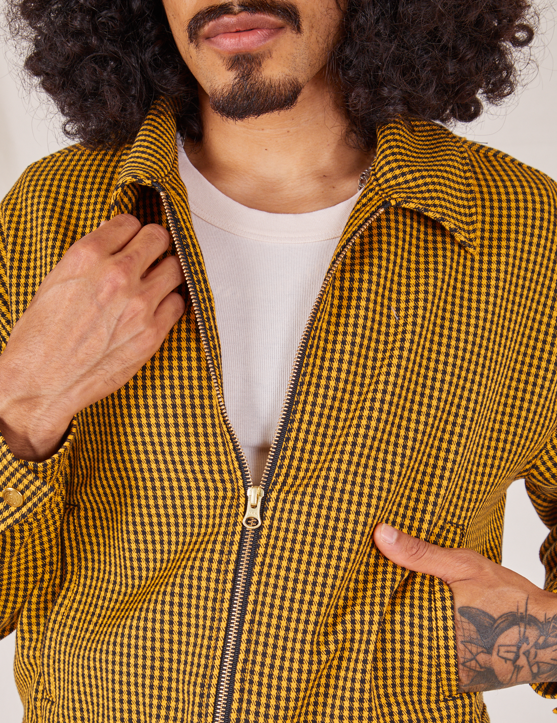 Front close up of Ricky Jacket in Checker Yellow worn by Jesse