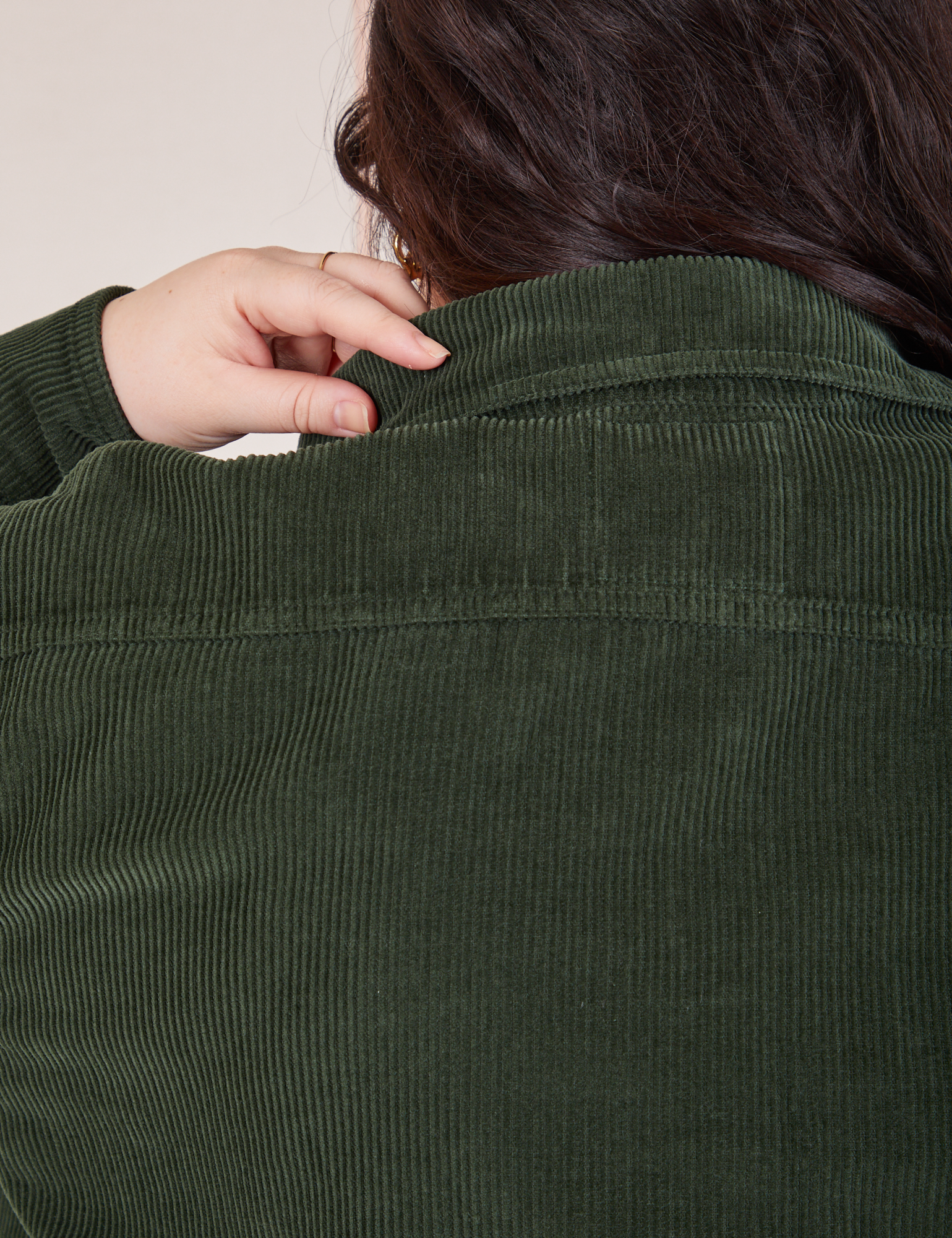 Back view collar close up of Corduroy Overshirt in Swamp Green on Ashley