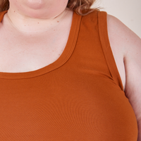 Front close up of Cropped Tank Top in Burnt Terracotta worn by Catie