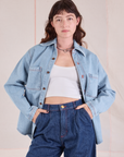 Alex is 5'8" and wearing P Denim Overshirt in Light Wash paired with dark wash Denim Trousers