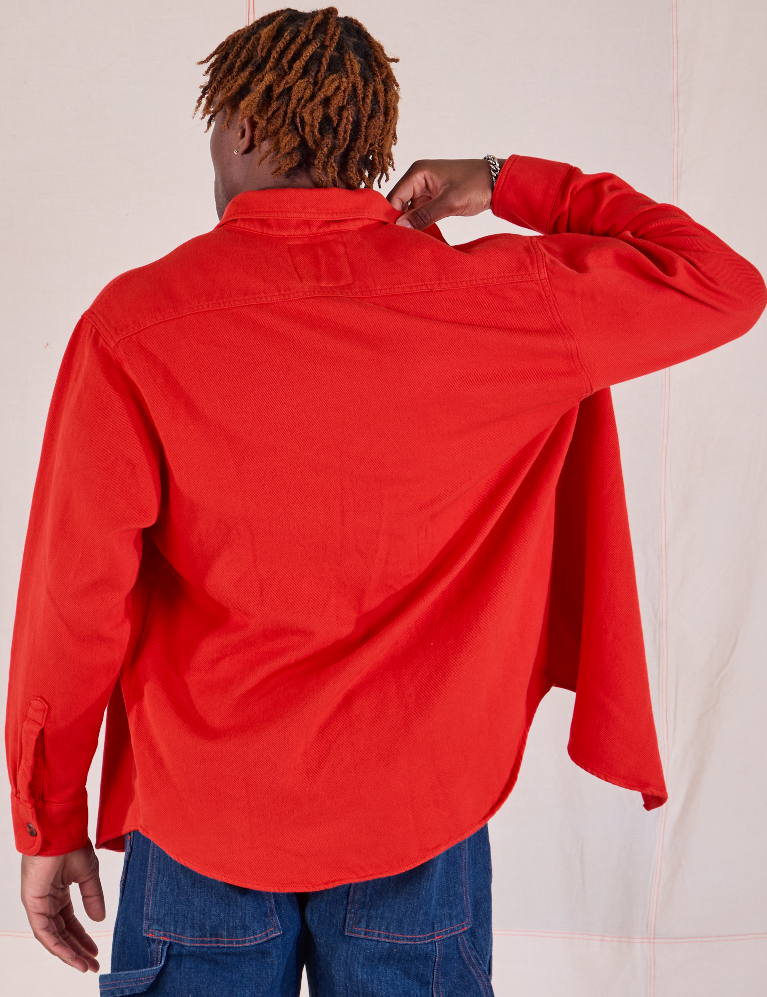 Back view of Flannel Overshirt in Mustang Red on Isaac