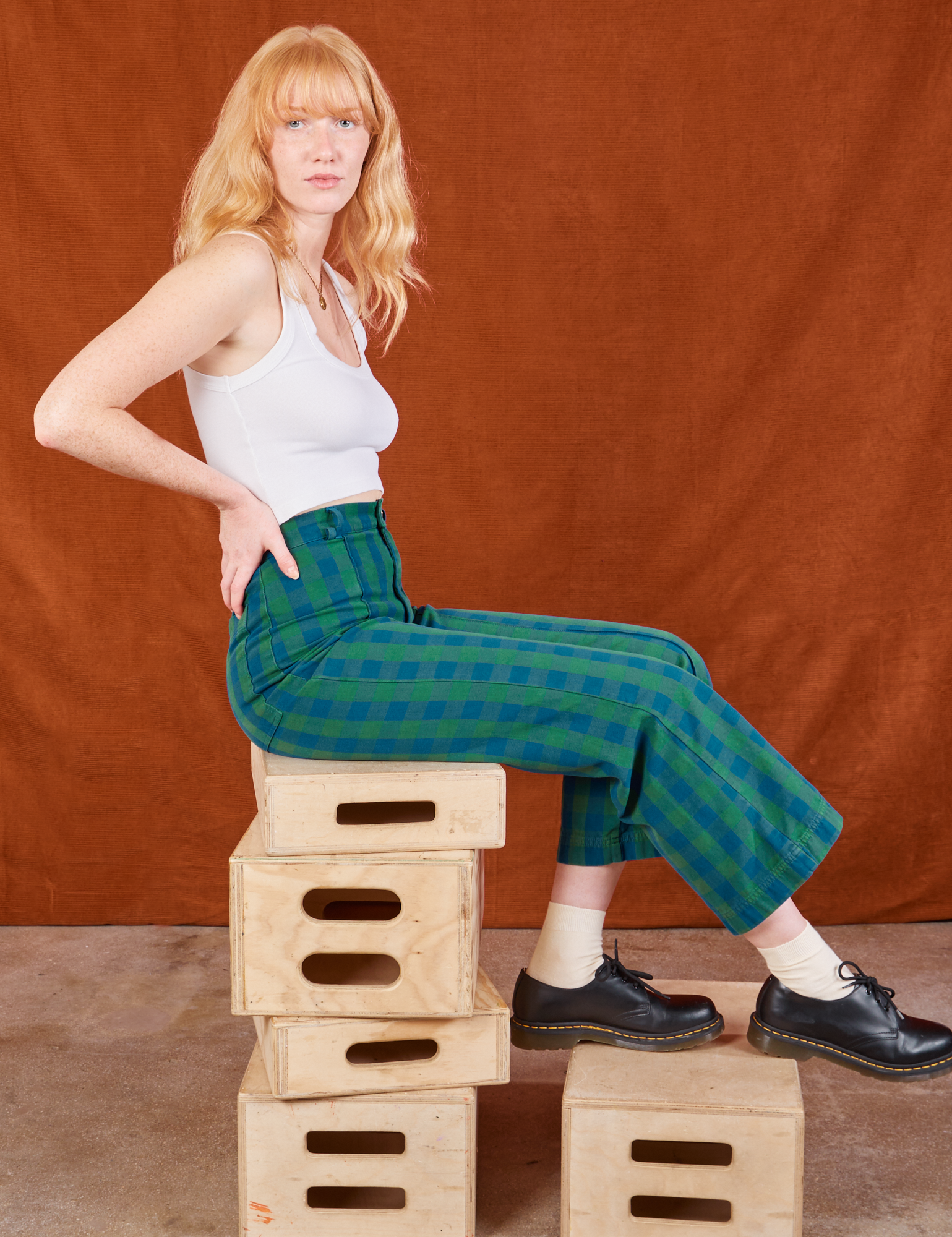 Margaret is wearing Gingham Western Pants in Green and Cropped Tank in vintage tee off-white