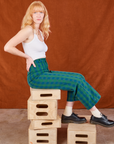 Margaret is wearing Gingham Western Pants in Green and Cropped Tank in vintage tee off-white