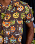 Short Sleeve Jumpsuit in Halloween Masks front close up on Jerrod