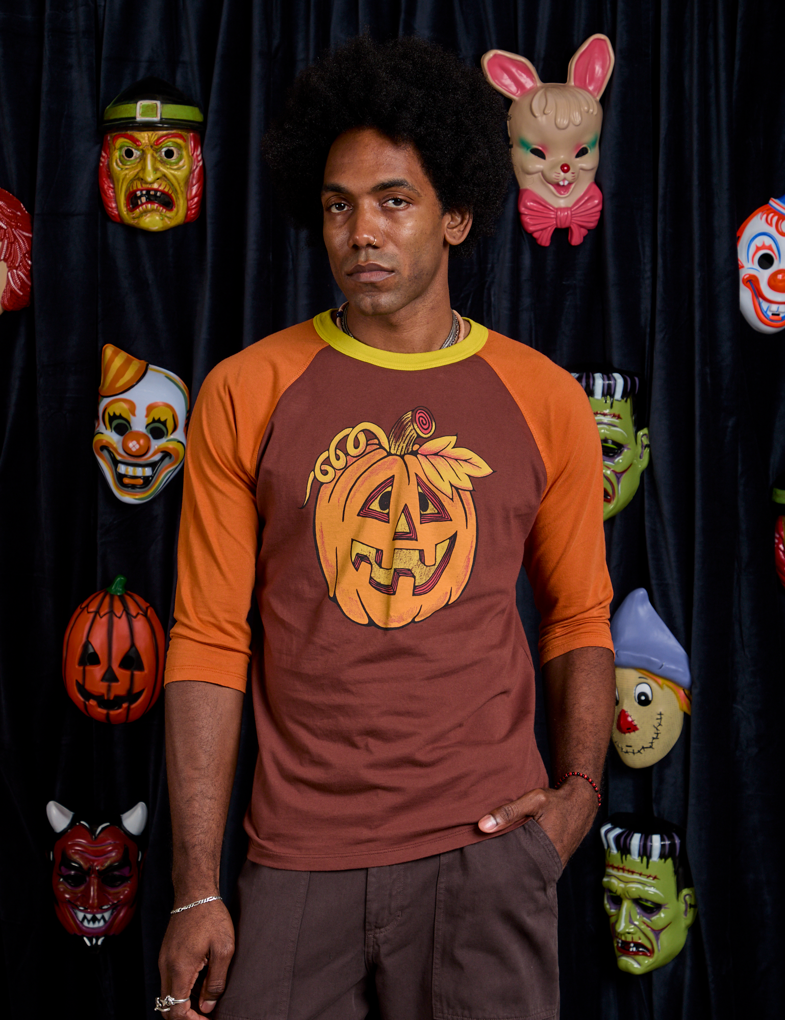 Jerrod is 6&#39;3&quot; and wearing M Raglan Tee in Jack-O-Lantern