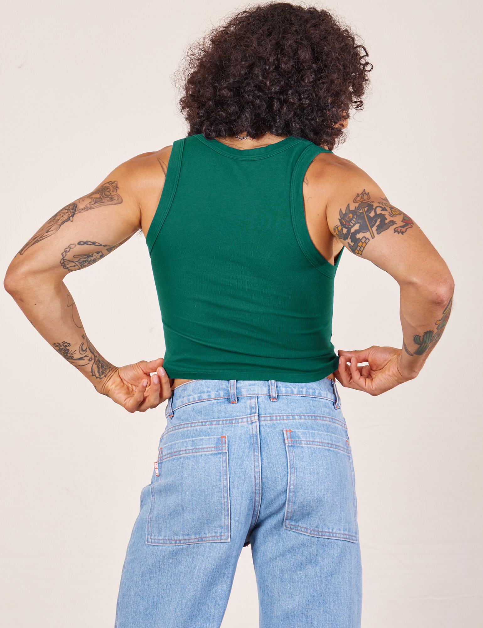 Back view of Cropped Tank Top in Hunter Green worn by Jesse