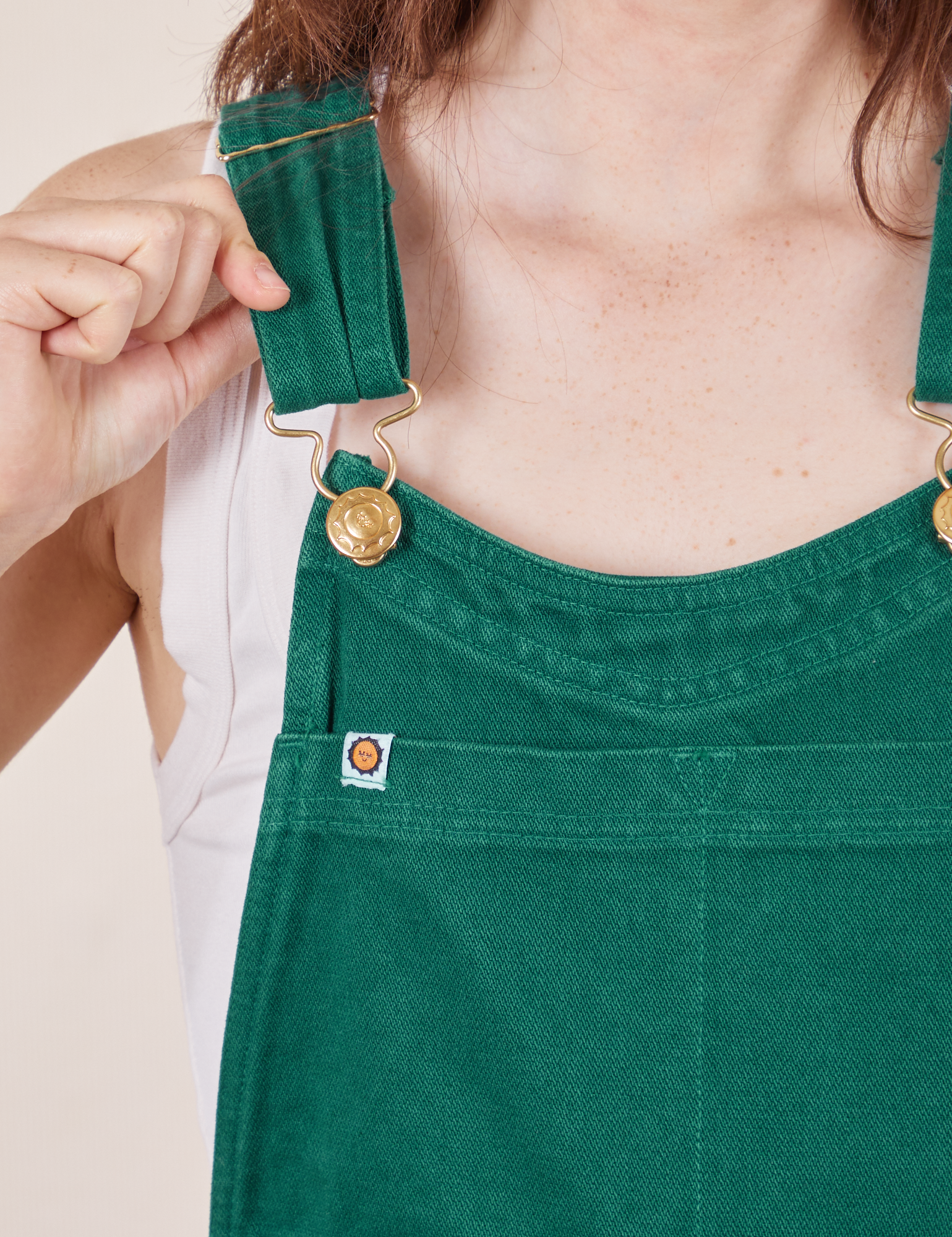 Front close up of Original Overalls in Mono Hunter Green on Hana