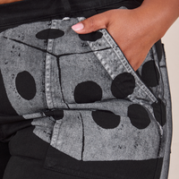 Front pocket close up of Icon Work Pants in Dice. Morgan has her hand in the pocket.
