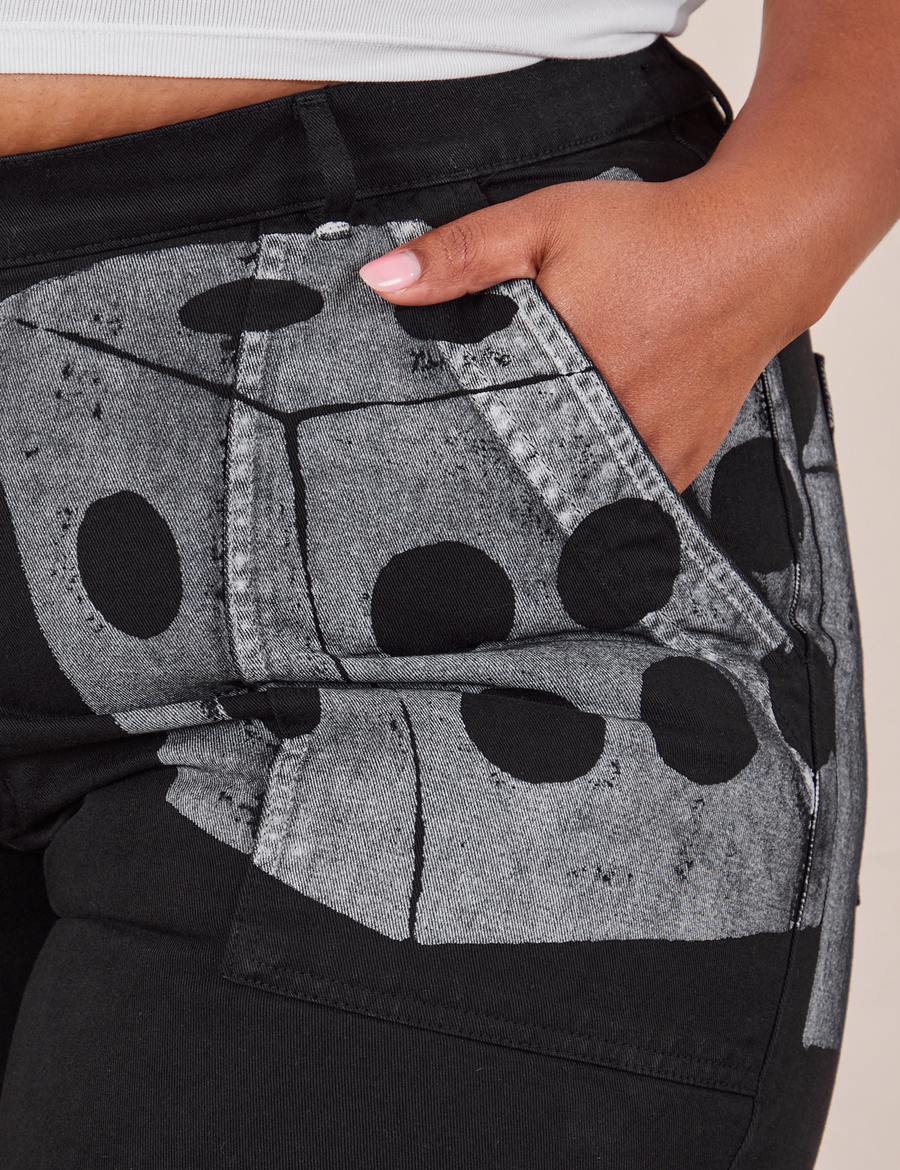 Front pocket close up of Icon Work Pants in Dice. Morgan has her hand in the pocket.