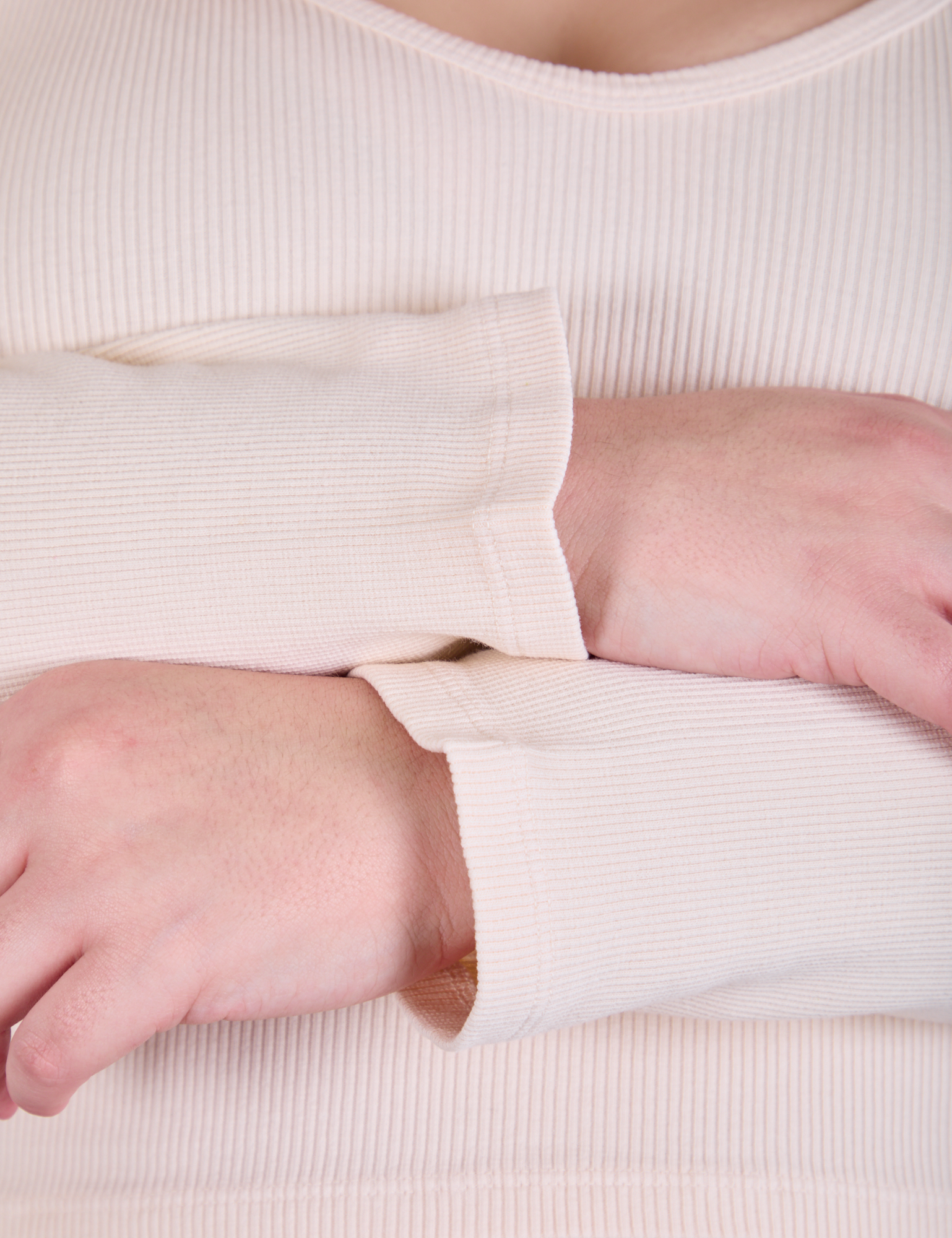 Long Sleeve V-Neck Tee in Vintage Tee Off-White sleeve close up on Marielena