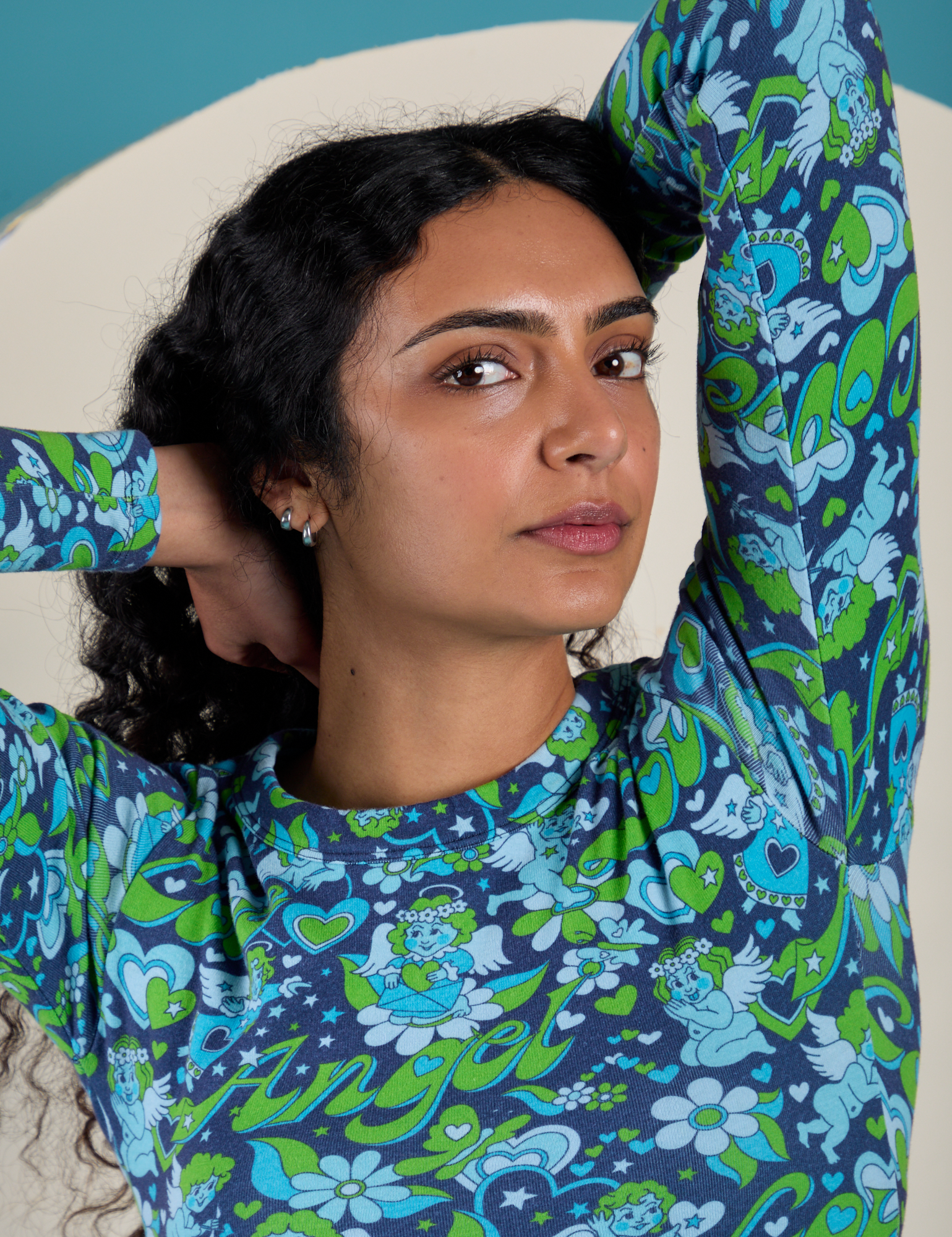 Long Sleeve Baby Tee in Angel Print front close up on Shahana