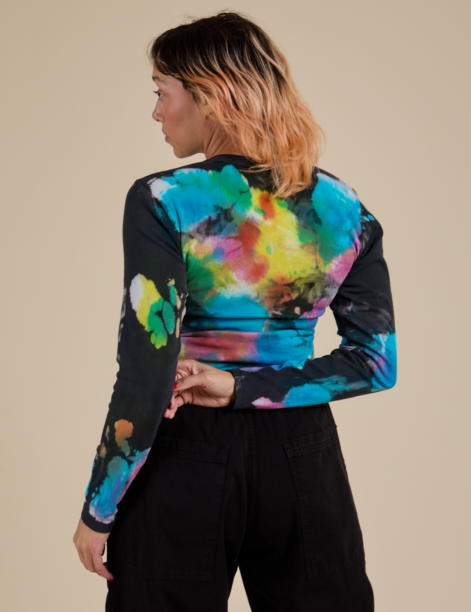 Long Sleeve Baby Tee in Rainbow Magic Waters back view on Tiara