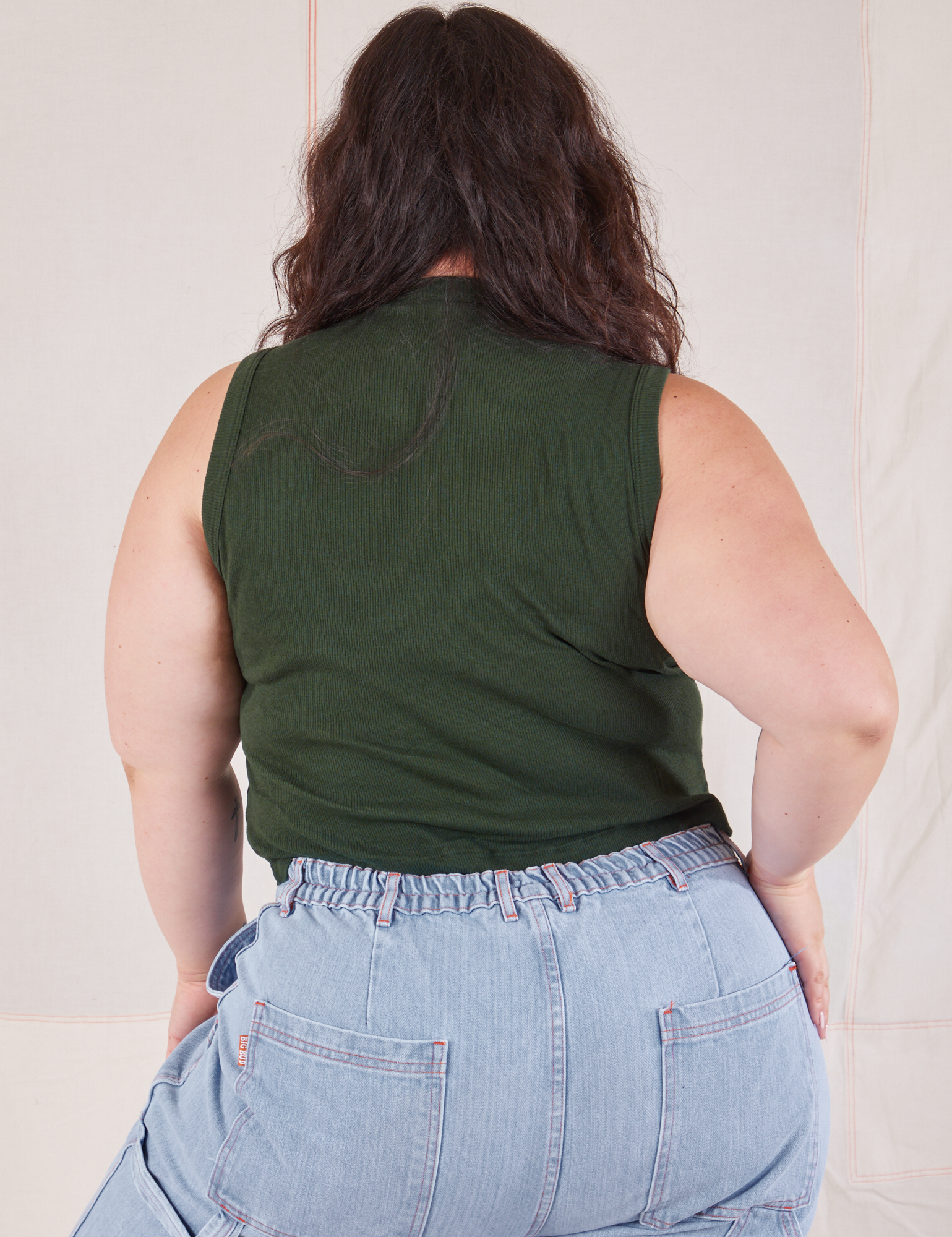 Muscle Tee in Swamp Green back view on Ashley