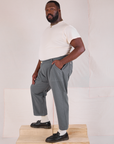 Side view of Mid-Rise Work Pants in Slate Grey and Organic Vintage Tee in vintage tee off-white on Elijah