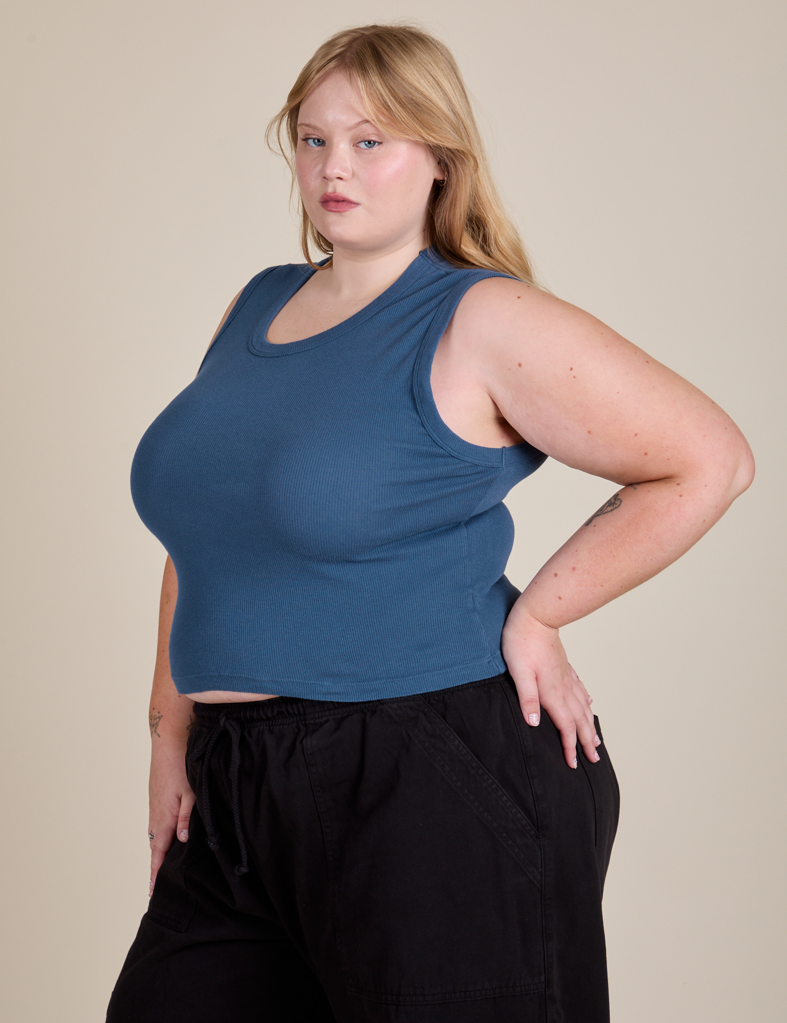 Angled front view of Muscle Tee in French Blue on Juliet