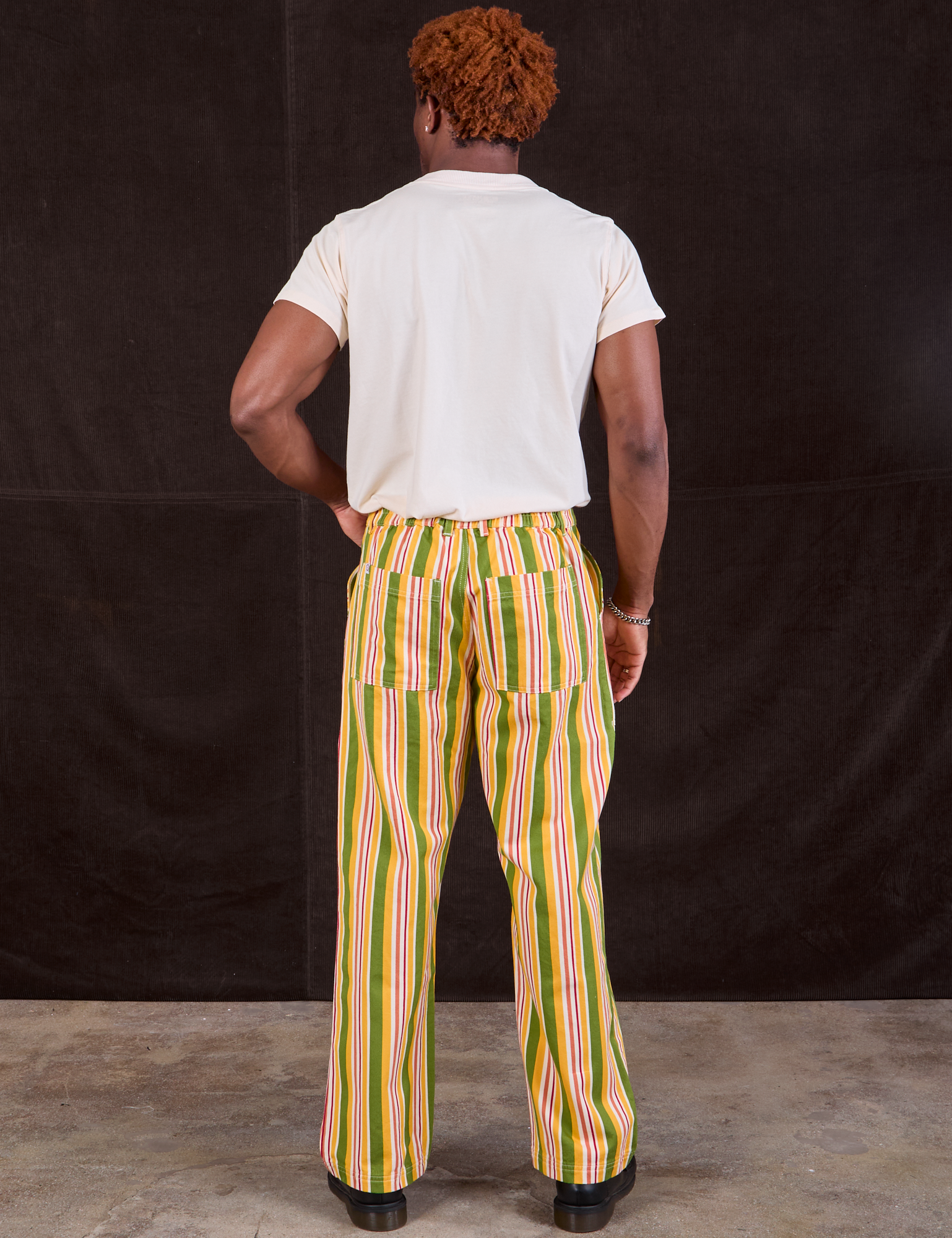 Back view of Stripe Work Pants in Vintage Sofa and Organic Vintage Tee in vintage tee off-white