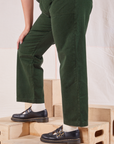 Organic Work Pants in Swamp Green side pant leg close up on Ryan