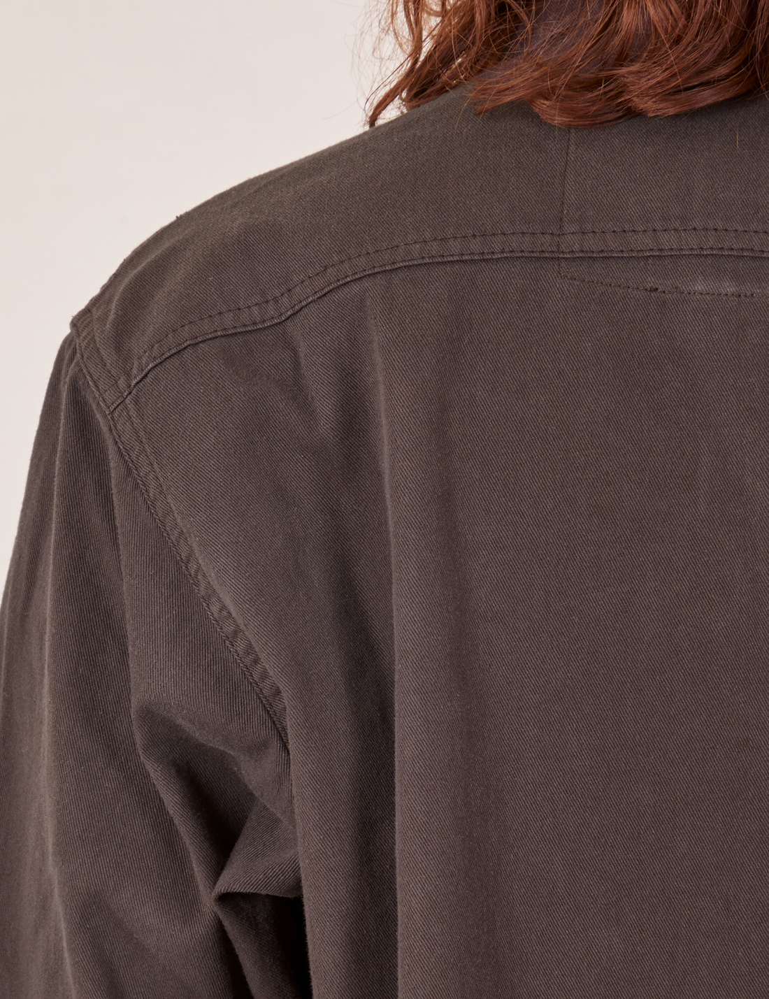 Back shoulder close up of Oversize Overshirt in Espresso Brown worn by Alex