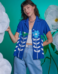 Alex is 5'8" and wearing XXS Paintstamped Pantry Button-Up in Daisy