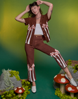 Alex is wearing Paintstamped Pantry Button-Up in Mushroom and matching Work Pants