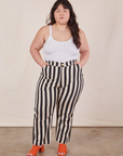 Ashley is 5’7” and wearing 1XL Petite Black Striped Work Pants in White paired with vintage off-white Cropped Cami