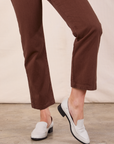 Short Sleeve Jumpsuit in Fudgesicle Brown pant leg close up on Alex