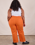 Work Pants in Construction Orange back view of Morgan