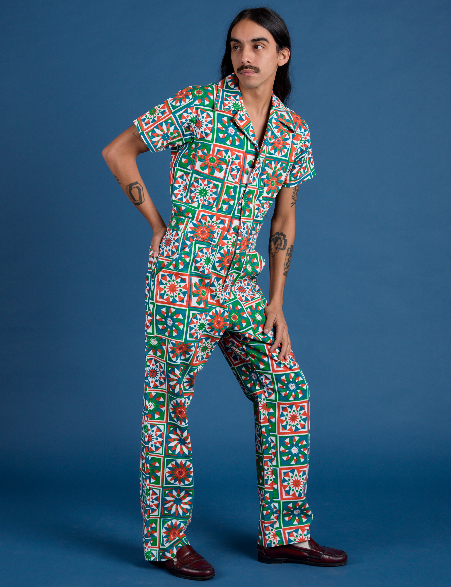 Angled front view of Quilt Print Jumpsuit on Anthony