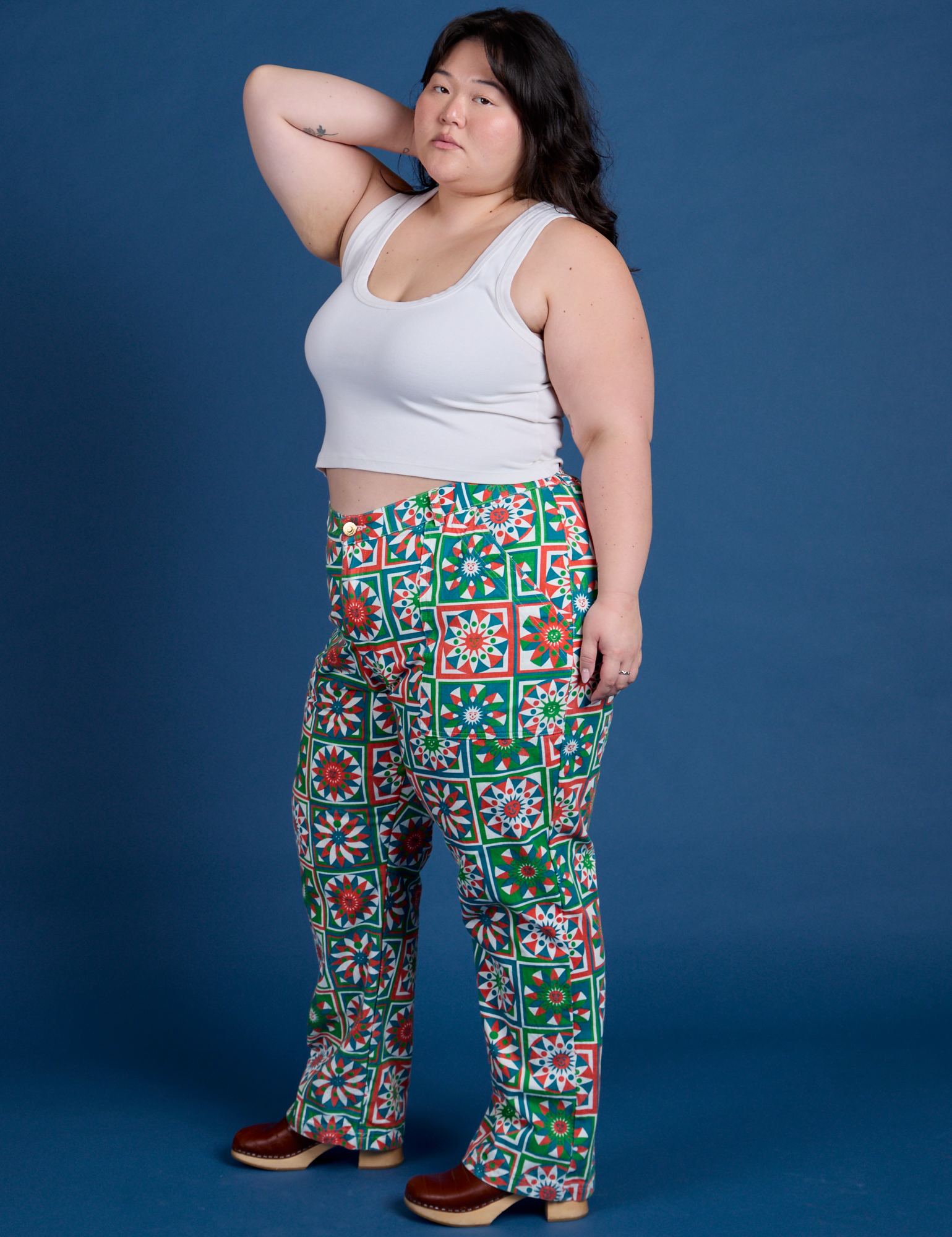 Side view of Work Pants in Quilt Print and vintage tee white Cropped Tank