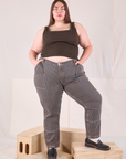 Marielena is 5'8" and wearing 2XL Railroad Carpenter Jeans in Vintage Tan paired with espresso brown Square Neck Tank