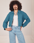 Ricky Jacket in Marine Blue, vintage off-white Tank Top, and light wash Frontier Jeans on Jesse