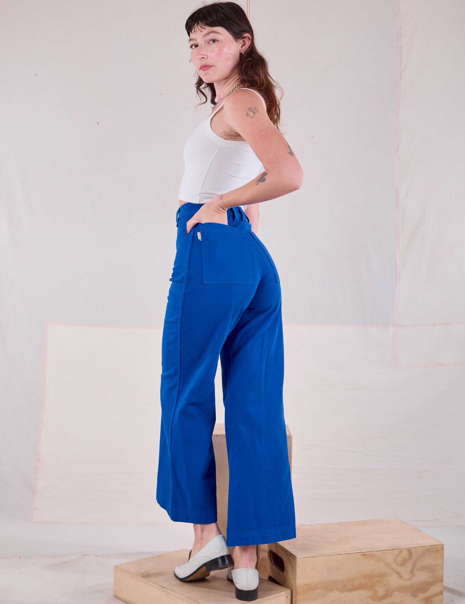 Bell Bottoms in Royal Blue angled back view on Alex