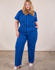 Juliet is 5'7" and wearing 1XL Short Sleeve Jumpsuit in Royal Blue