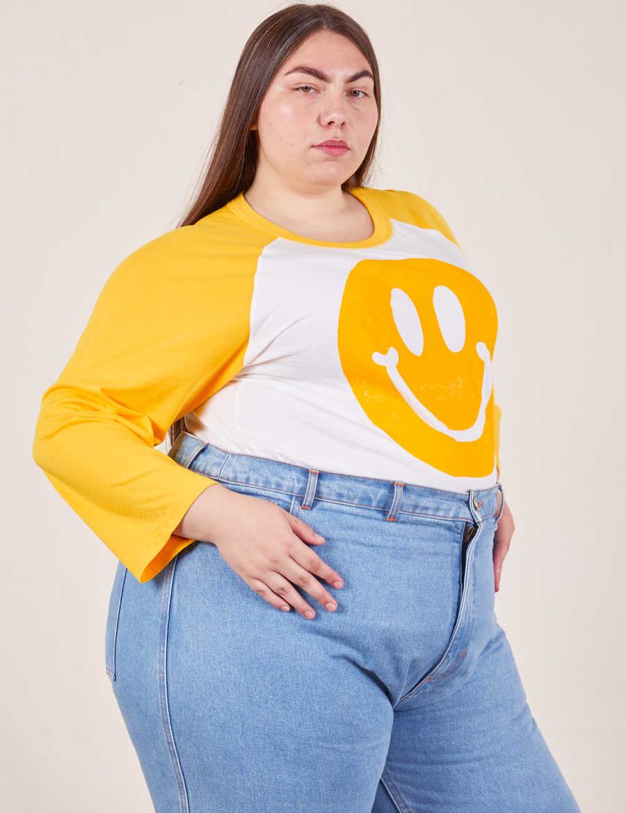 Paintstamp Smiley Raglan Tee angled view on Marielena