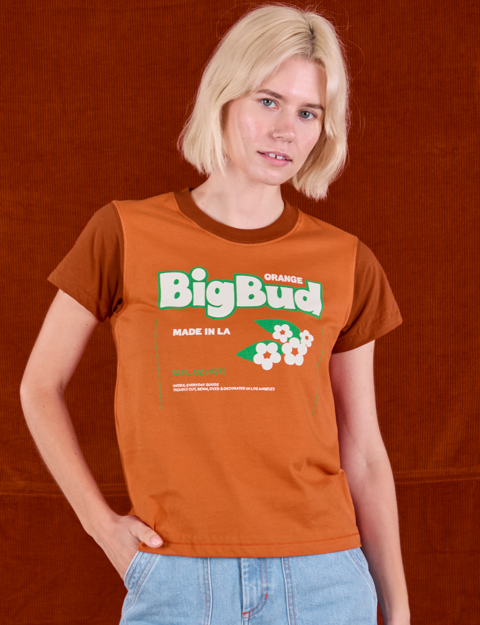 Madeline is 5&#39;9&quot; and wearing P Vintage Tee in Orange Soda