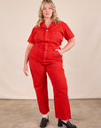 Lish is 5'8" and wearing L Short Sleeve Jumpsuit in Mustang Red