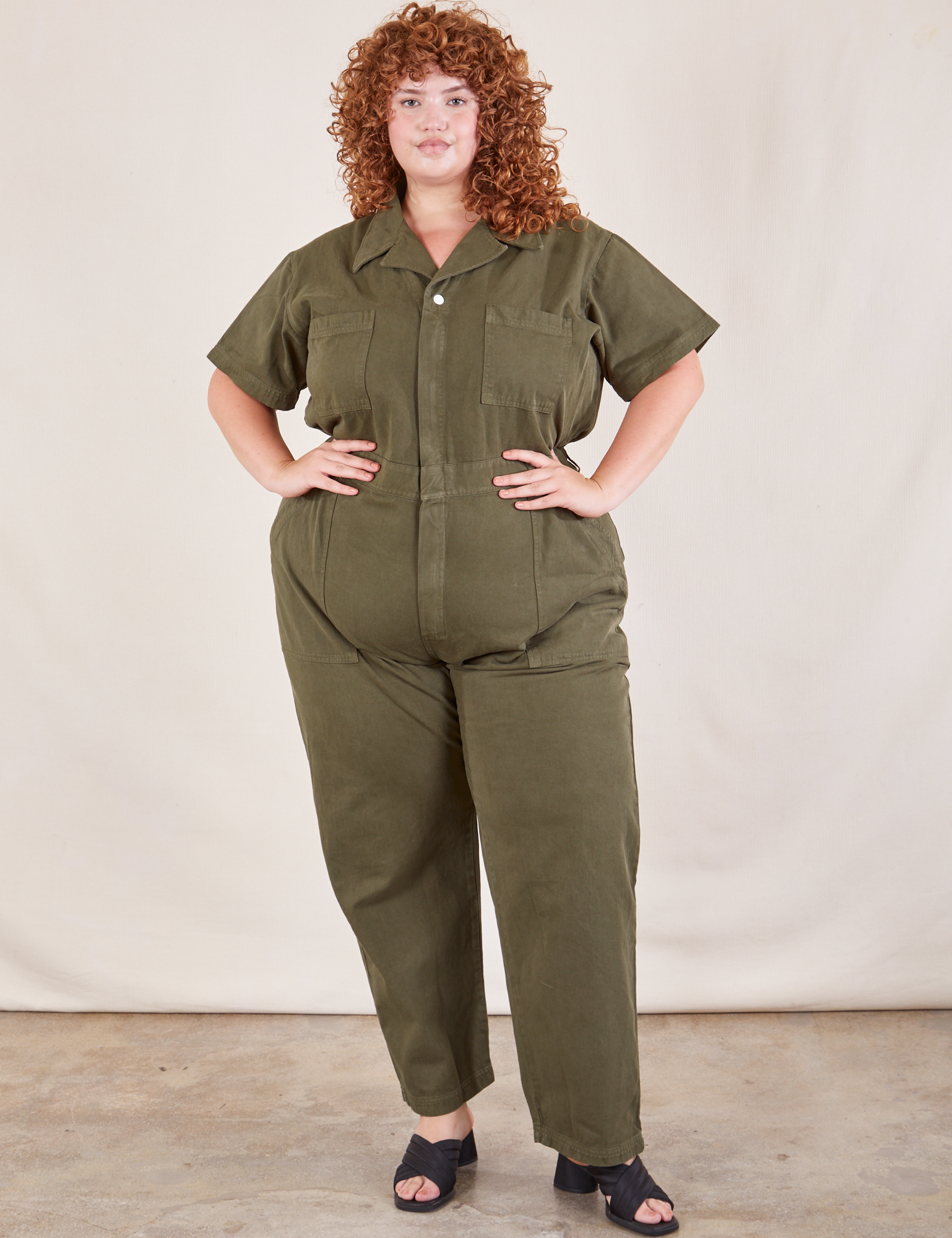 Bree is 5&#39;10 and wearing 2XL Short Sleeve Jumpsuit in Surplus Green