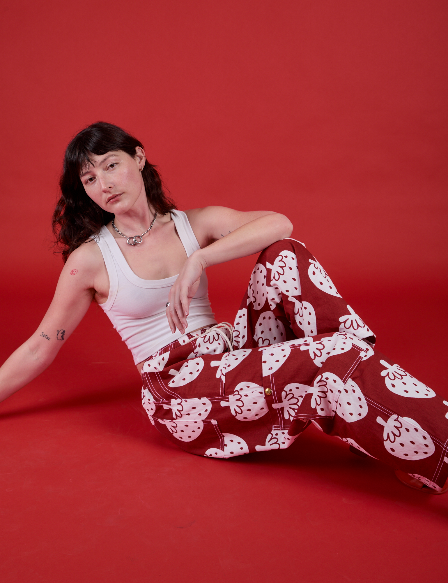 Alex is wearing Drop Pocket Pants in Strawbaby and Cropped Tank in Vintage Tee White