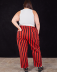 Black Stripe Work Pants in Mustang Red back view on Katie