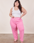 Ashley is 5'7" and wearing XL Cropped Rolled Cuff Sweatpants in Bubblegum Pink paired with vintage off-white Tank Top