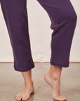 Cropped Rolled Cuff Sweatpants in Nebula Purple pant leg close up on Alex
