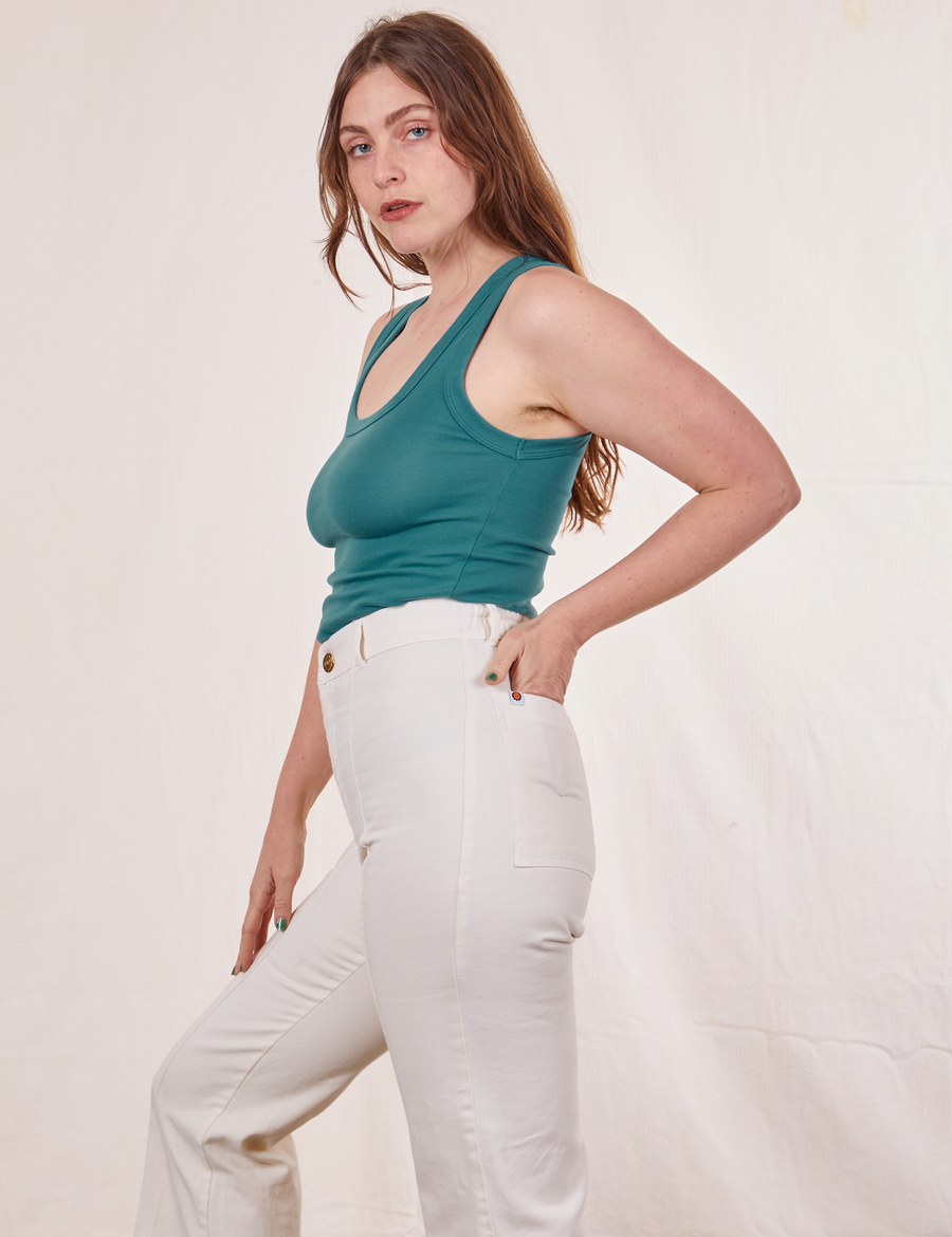 Tank Top in Marine Blue side view on Allison wearing vintage off-white Western Pants