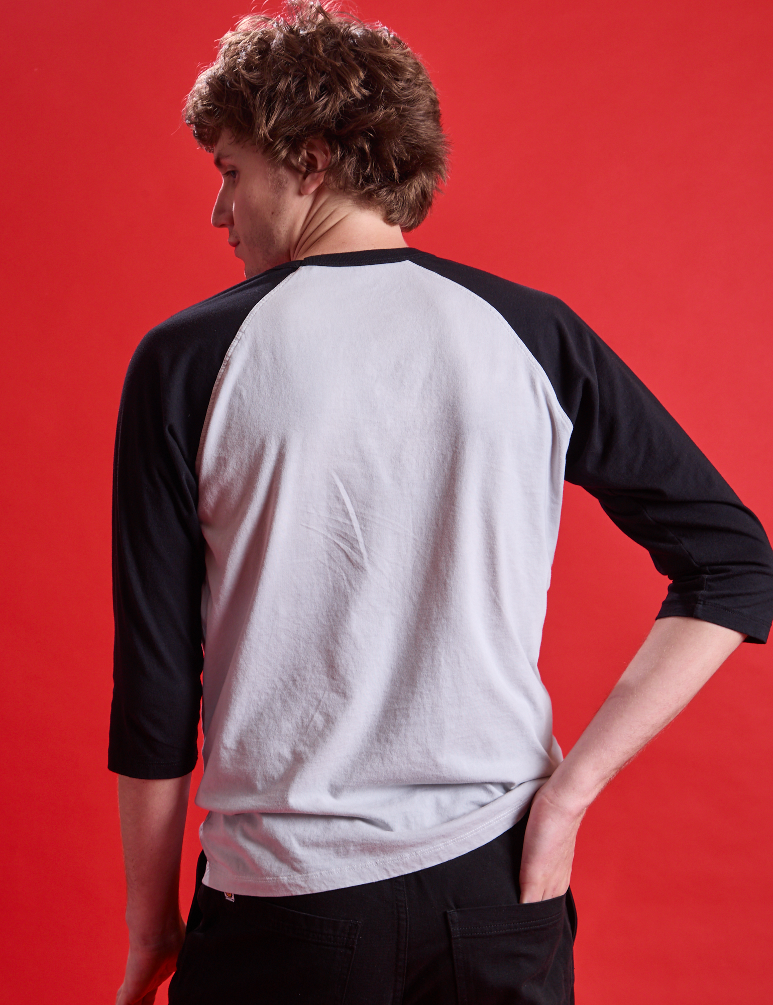Taxi Raglan Tee in Los Angeles back view on Quinn