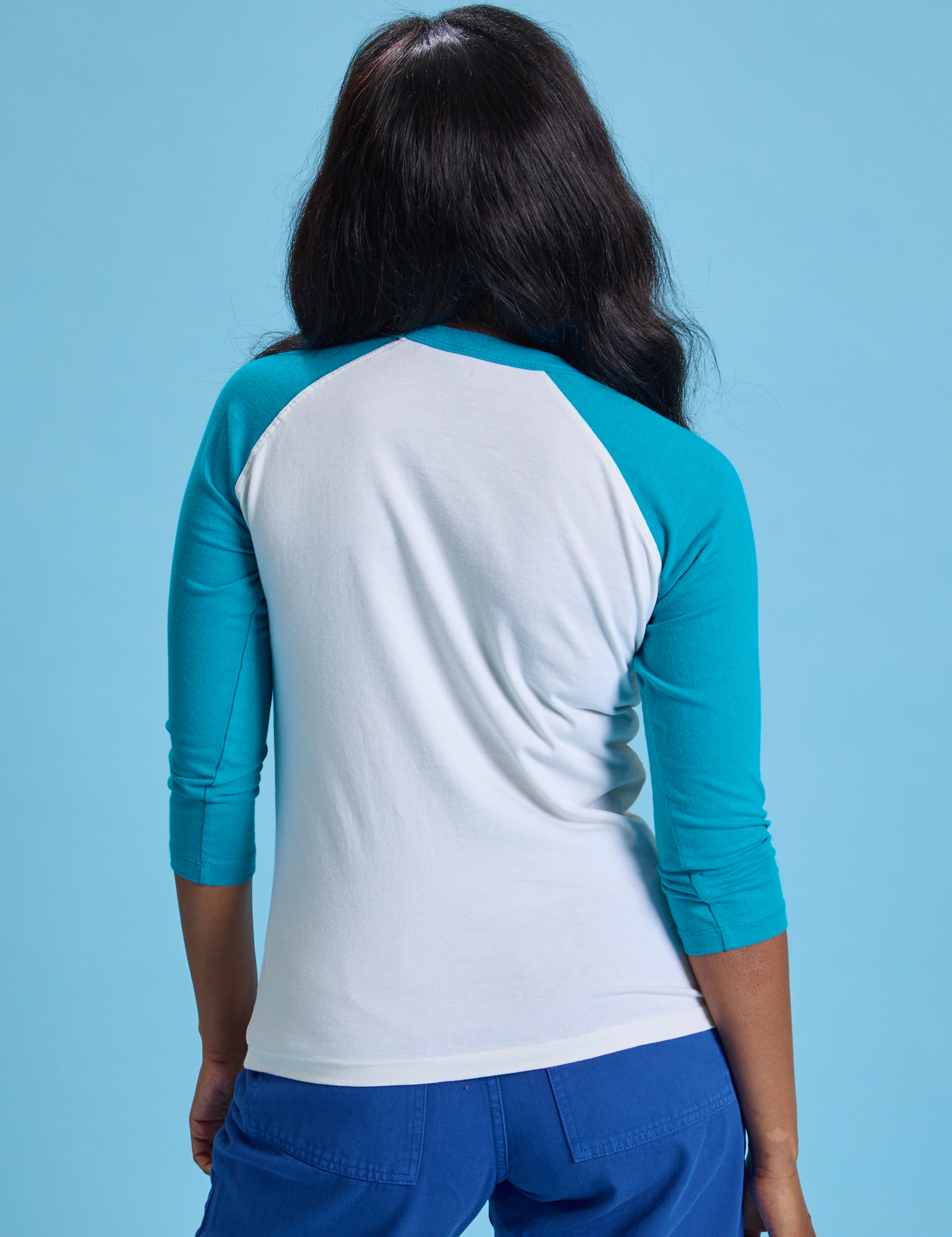 Taxi Raglan Tee in San Francisco back view on Kandia
