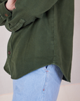 Flannel Overshirt in Swamp Green side view bottom hem close up on Alex